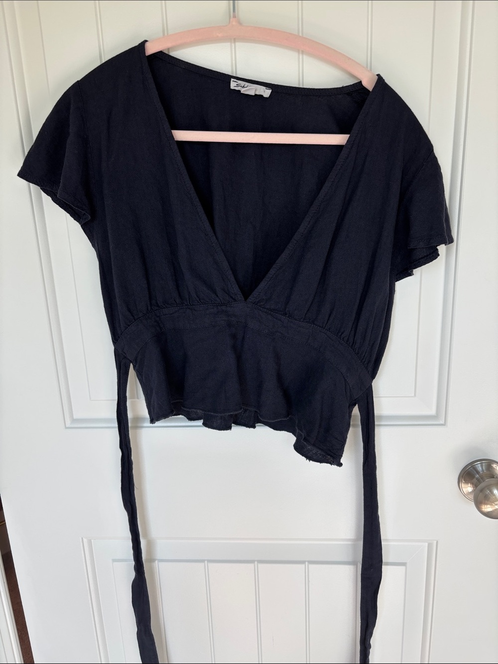 Subdued navy blue top